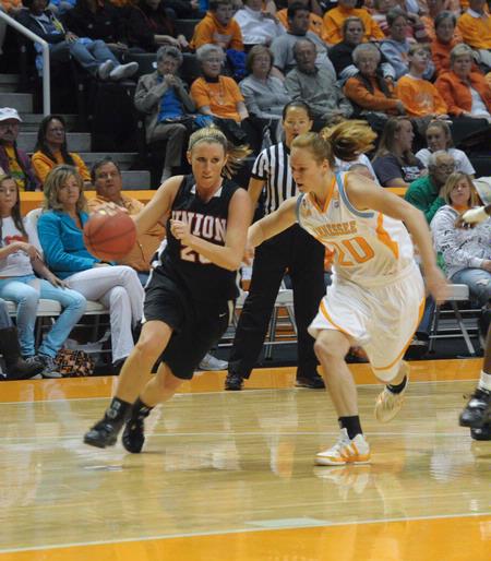 Kayla Hudson works the ball around Lady Vol Sydney Smallbone during the exhibition game played in Knoxville. - Photo by Morris Abernathy
