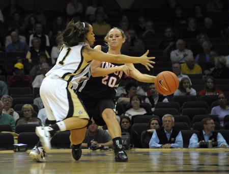 Kayla Hudson works the ball into the paint in the exhibition game against Vanderbilt's Lady Commodores. - Photo by Morris Abernathy
