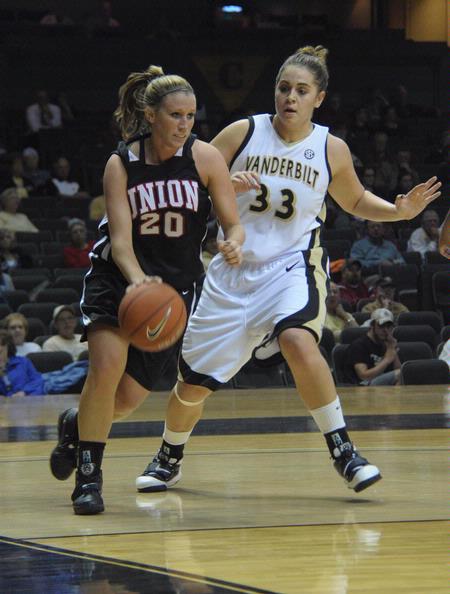 Kayla Hudson dribbles the ball around Vanderbilt's Rebecca Silinski during an exhibition game held at Vandy.  - Photo by Morris Abernathy