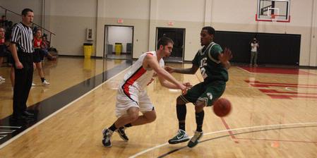 Daniel Kelley dribbles past his Life University opponent to look for a pass. 
 - Photo by Ebbie Davis