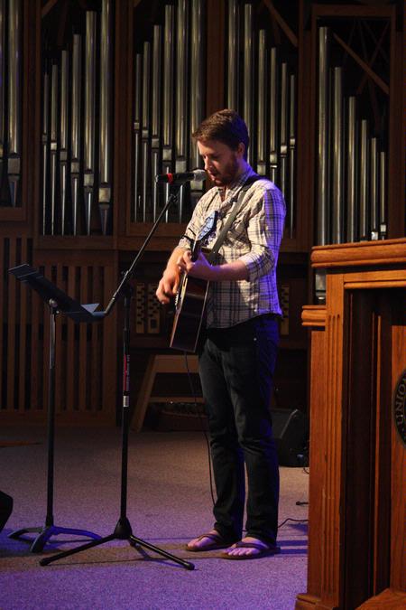T.J. Hester, junior philosophy major, leads Union students in song during chapel.  - Photo by Ebbie Davis