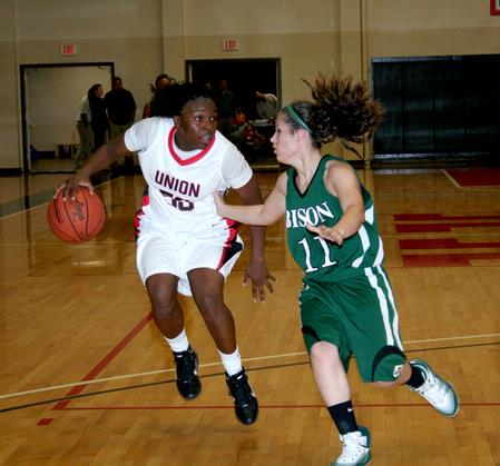 Lavanda Ross makes her way down the court during the first game of the Rotary Classic in which the Lady Bulldogs defeated Oklahoma Baptist University to advance to the second round.  - Photo by Deanna Santangelo