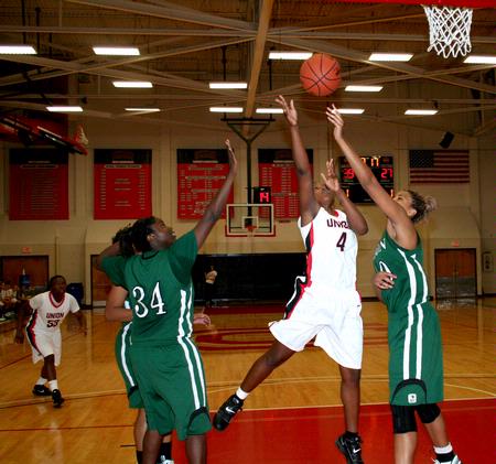 Hope Adams goes for a lay-up during the first round of the 17th Annual Jackson Rotary Classic against Oklahoma Baptist University. - Photo by Deanna Santangelo