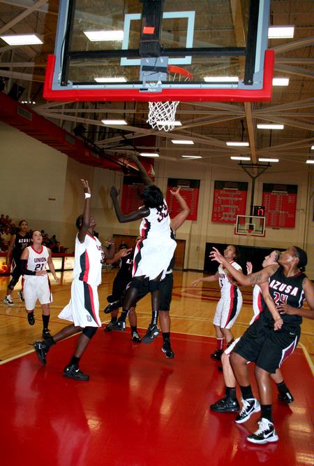 Zeinab Chan blocks a shot during the game against Azusa Pacific (Calif.) on the second day of the 17th Annual Jackson Rotary Classic, Nov. 19. The Lady Bulldogs defeated Azusa Pacific 61—50.
 - Photo by Deanna Santangelo