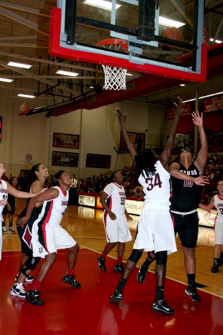Beatrice Awino Duol blocks a lay-up during the game against Azusa Pacific University in the second round of the 17th Annual Jackson Rotary Classic. The Lady Bulldogs beat Azusa Pacific 61-50. - Photo by Deanna Santangelo