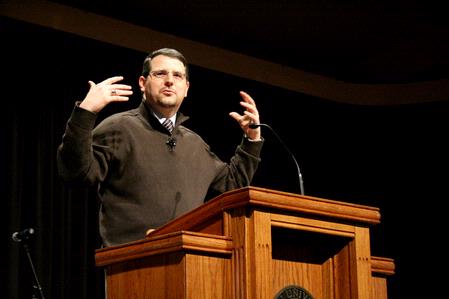 Keith Bates, associate professor of History, speaks in chapel. - Photo by Deanna Santangelo