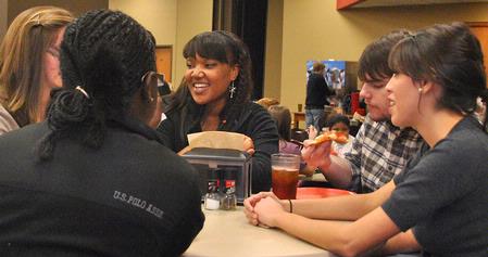 The Student Activities Council sponsors the annual Carl Perkins Christmas Party. Union students Taneka Reynolds, Tyler Strong, and Claudia Velasco get to know the child they sponsored. - Photo by Victoria Stargel