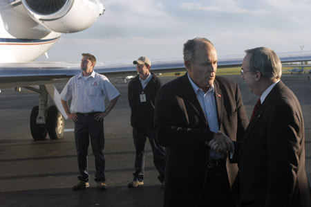 2003 Scholarship Banquet speaker Rudolph Giuliani visits with President David S. Dockery shortly after arriving at the McKellar-Sipes Airport in Jackson. - Photo by Jim Veneman