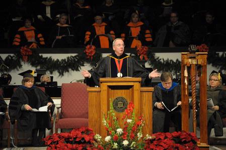 David S. Dockery, president of the university, presents the 2010 fall graduating class.  - Photo by Morris Abernathy