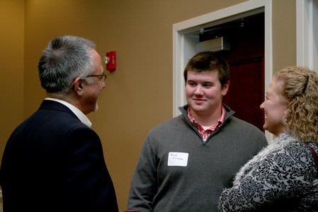 Richard Grimm, senior vice president for enrollment services, talks with prospective student Noah Killebrew and his family during a winter preview day. - Photo by Deanna Santangelo