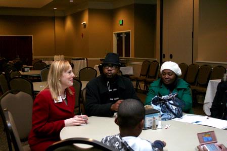 Kimberly Thornbury, vice president for student services and dean of students, talks with a prospective student and her family during a preview day. - Photo by Deanna Santangelo