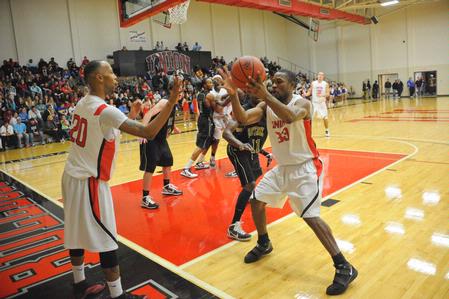 The Bulldogs play offense against Bethel University.  - Photo by Morris Abernathy