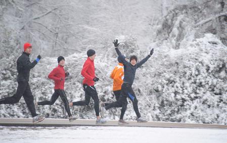 The cross country team doesn't let anything stop them from running, even snow! - Photo by Morris Abernathy