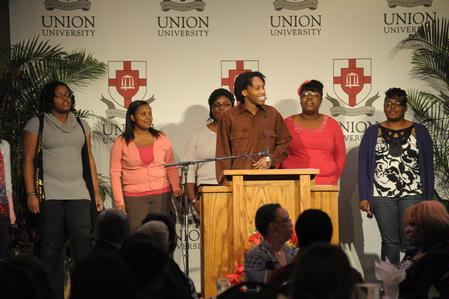 MOSAIC choir sings at the start of the 4th Annual Black History Month program. - Photo by Morris Abernathy