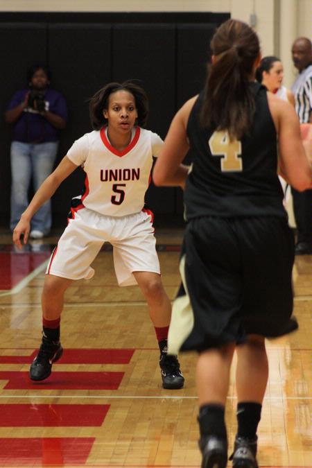 LaTesa McLaughlin prepares to defend the basket in a game against Bethel University. The Lady Bulldogs won the game 81-62. - Photo by Ebbie Davis