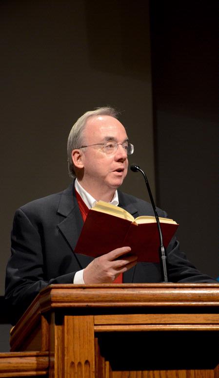 David S. Dockery, president of the university, greets students and introduces speaker, Chuck Lawless, dean of the Billy Graham school of missions and theology at Southern Baptist Theological Seminary, during chapel. - Photo by Deanna Santangelo