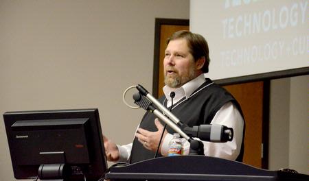 Dr. C. Ben Mitchell, Graves professor of moral philosophy, speaks on "Perfecting Ourselves to Death: Technology, Humanity, and the Quest for Perfection" at the Town & Gown lecture series. - Photo by Deanna Santangelo