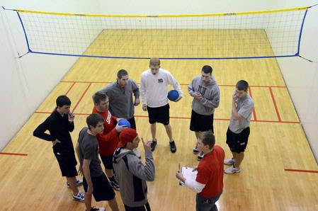 Blake Pennington, intramural coordinator, explains rules for intramural wall ball in the racquetball courts.  - Photo by Beth Spain