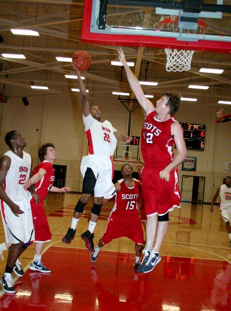 Stan McNeil goes in for a lay up during the game against Lyon College. The Bulldogs ended up with a 73-40 win. - Photo by Deanna Santangelo