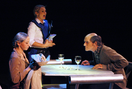 Molly Williams as Cassandra Hooper serves Miranda Wallace and Patrick Myers as Marvin and Millie Standard in <i>You Have To Serve Somebody</i>. - Photo by Jim Veneman