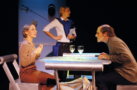 Miranda Wallace as Millie Stardard addresses Patrick Myers as Marvin Standard while Molly Williams waits on them as Cassandra Hooper in <i>You Have To Serve Somebody</i>. - Photo by Jim Veneman