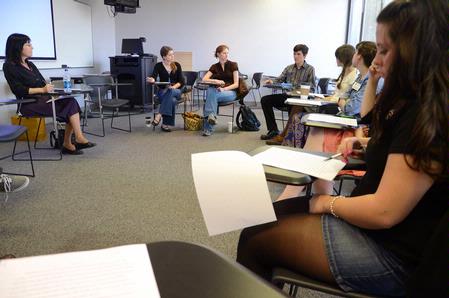 Guest writer Lorraine M. Lopez shares her advice and experience with a group of English students during a creative writing workshop.  - Photo by Abigail Harris