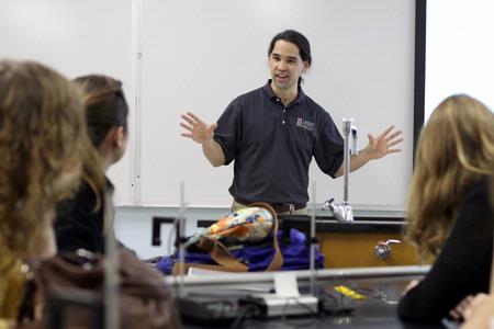 Fonsie Guilaran, associate professor of physics, gives instructions before a physics lab assignment.  - Photo by Kristi McMurry Woody