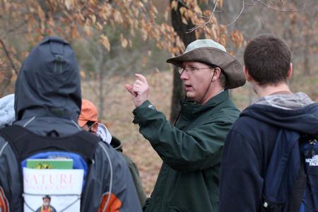 Andy Madison, associate professor of biology, talks to his conservation biology students during a field trip to the West TN Research & Education Center. - Photo by Kristi McMurry Woody
