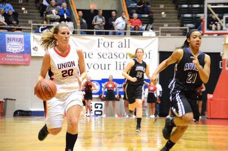 Kayla Hudson dribbles down the court in the first game of the NAIA National Championship. The Lady Bulldogs advanced to the second round with a win of 62-37 against Avila University.  - Photo by Abigail Harris