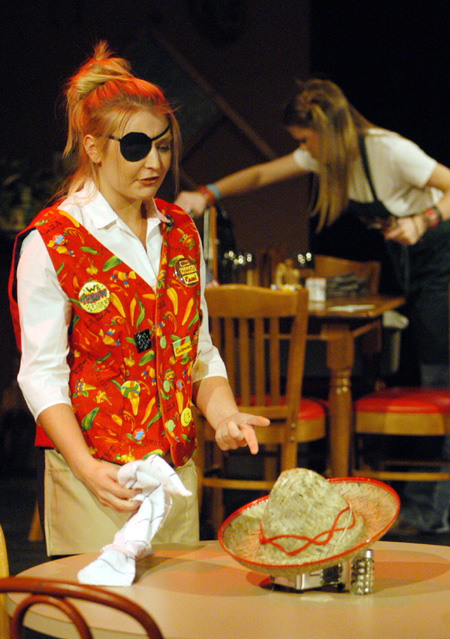 Molly Williams as Cassandra Hooper and Courtney Braswell as Denny Standard clean tables in in <i>You Have To Serve Somebody</i>. - Photo by Jim Veneman