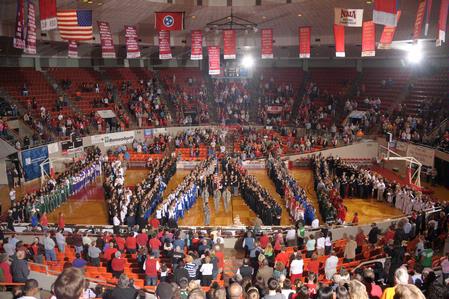 The 2011 NAIA Division I Women's Basketball National Championship teams spell out NAIA before the start of Union University's game on Wednesday night at Oman Arena. - Photo by Morris Abernathy