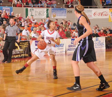 LaTesa McLaughlin brings the ball down the court in game one of the NAIA National Championship. The Lady Bulldogs defeated Avila University to advance to the second round of the championship. - Photo by Morris Abernathy