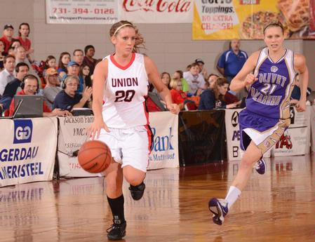Kayla Hudson brings the ball down the court during the very fast-paced second game of the NAIA National Championship against Olivet Nazarene University. - Photo by Morris Abernathy