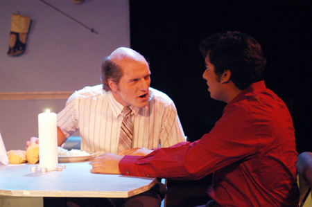 Patrick Myers as Marvin Standard addresses Lucas Villalpondo as Hector Hazada in <i>You Have To Serve Somebody</i>. - Photo by Jim Veneman