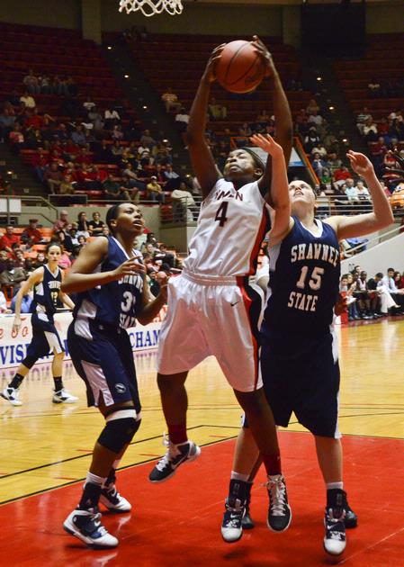 Hope Adams battles for a rebound in the semifinals game against Shawnee State University. - Photo by Beth Spain