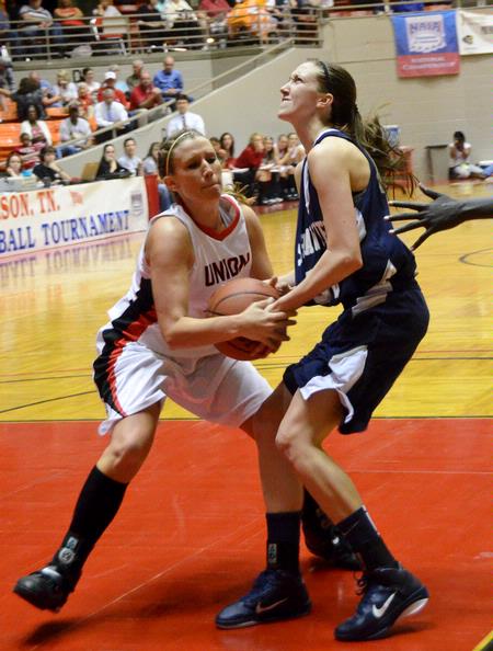 Kayla Hudson steals the ball from her Shawnee State University opponent in the quarterfinals of the NAIA National Championship. The Lady Bulldogs won the game and advanced to the semifinals. - Photo by Beth Spain