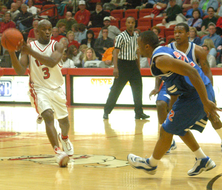 Chima Abakwue (3), a senior guard for the Bulldogs, looks to pass the ball on a fast break.  Abakwue owns the Union record for three pointers made in a career and three pointers made in a game. - Photo by Courtney Ross