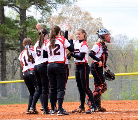 The Union Lady Bulldogs infield comes out of a huddle ready to sweep Cumberland University in a double-header. - Photo by Victoria Stargel