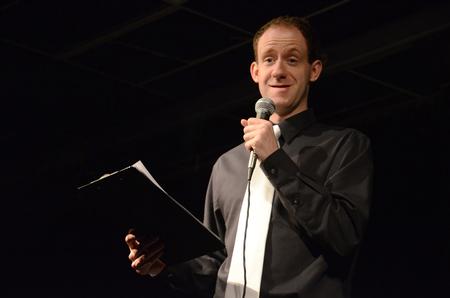 Chad Hoy, junior theater and speech major, hosts Broadway Caberet in the theater, where students preform Broadway songs while the audience enjoys the show with dessert. - Photo by Abigail Harris