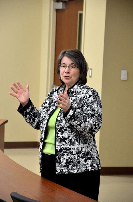 Mary Anne Poe, director of Center for Just and Caring Communities, speaks during the Town & Gown in Providence Hall. - Photo by Deanna Santangelo