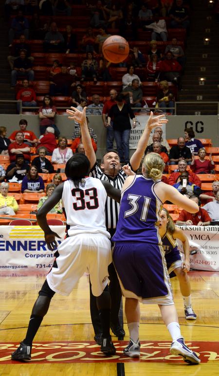 Zeinab Chan jumps for the toss-up. Union Lady Bulldogs play Olivet Nazarene in the second round of the 2011 NAIA Division I Women's Basketball National Championship. Union won 81 to 69.  - Photo by Ebbie Davis