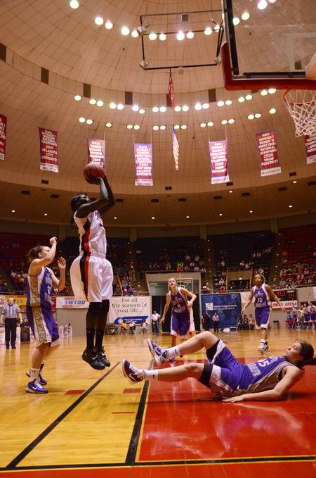 Zeinab Chan shoots a 2-pointer in the second game of the NAIA National Championship against Olivet Nazarene. The Lady Bulldogs won 81 to 69.  - Photo by Ebbie Davis