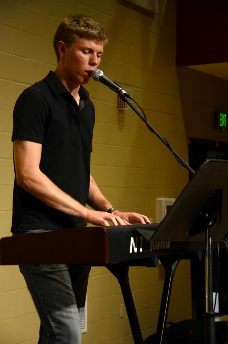 Karl Magnuson, junior engineering major, helps lead music at the first Abraham's Altar event held in the Bowld Student Commons. This student led revival attracted many people for the first session.  - Photo by Ebbie Davis