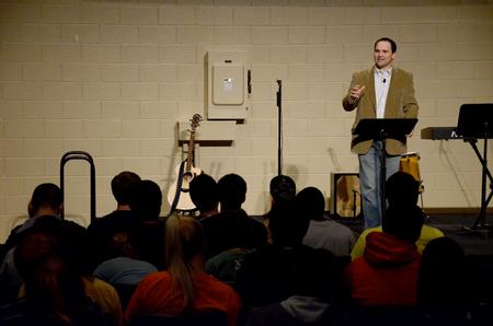 Justin Wainscott, pastor of First Baptist Church, speaks at the first annual Abraham's Altar, a student led revival at the middle of the semester.  - Photo by Ebbie Davis