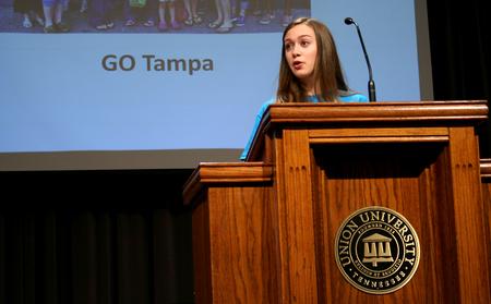 Samantha Adams, sophomore public relations major, speaks about her Go Trip to Tampa during Chapel. - Photo by Deanna Santangelo