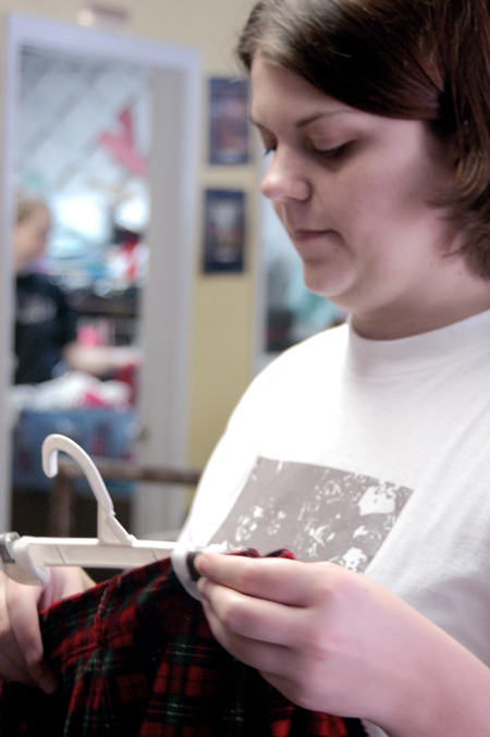 Sophomore Jennifer Hanes volunteers her time during Day of Remembrance. - Photo by Lindsay Stavish