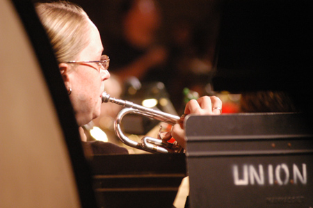 Symphonic Band member Katie Stephens plays the trumpet at <i>A Union Christmas: A Ceremony of Carols</i>. - Photo by Lindsay Stavish