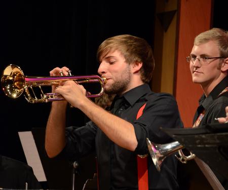 Chase Techentin, junior music major, plays a trumpet solo during the Union University Jazz Band concert. - Photo by Victoria Stargel