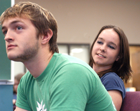 Sophomore Daniel Hall and his sister attend the Sibling Pizza Party during Family Weekend 2003. - Photo by Jonathan Blair