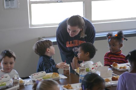 Sophomore Learning Foundations major Amanda Rushing answers a question during lunch at Parkview Montessori during Day of Remembrance 2003. - Photo by Jonathan Blair